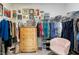 Spacious walk-in closet featuring ample storage, shelving, and a comfortable chair at 149 Ivory Ln, Raleigh, NC 27610