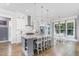 Bright, spacious kitchen with a large island, stainless steel appliances, and a breakfast nook at 150 Luxorwind Dr, Garner, NC 27529