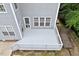 Aerial view of a private deck, backyard, and wood fence at 1505 Mclaurin Ln, Fuquay Varina, NC 27526