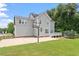 Expansive backyard includes patio, basketball court, trampoline, and space for outdoor activities at 1505 Mclaurin Ln, Fuquay Varina, NC 27526