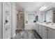 Bright bathroom features a marble shower and large soaking tub at 1505 Mclaurin Ln, Fuquay Varina, NC 27526
