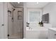 Bathroom with a large soaking tub and walk-in shower at 1505 Mclaurin Ln, Fuquay Varina, NC 27526