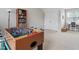 Bonus room with a foosball table and desk at 1505 Mclaurin Ln, Fuquay Varina, NC 27526