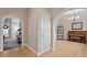 Home entryway showcasing an arched doorway and hardwood flooring at 1505 Mclaurin Ln, Fuquay Varina, NC 27526