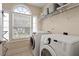 Bright laundry room with a washer and dryer at 1505 Mclaurin Ln, Fuquay Varina, NC 27526