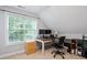 Office features a desk and large windows at 1505 Mclaurin Ln, Fuquay Varina, NC 27526