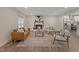 Spacious living room featuring a fireplace, stylish furniture, and an open layout at 1709 Hawthorne Lane Ln, Burlington, NC 27215