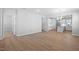 Spacious living room featuring hardwood floors and large windows at 173 Churchill Way, Clayton, NC 27520