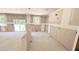 Large living room featuring neutral walls, recessed lighting, and access to the backyard at 189 Gobbler Dr, Smithfield, NC 27577