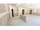 Spacious living room featuring neutral walls, white trim, and open floor plan at 189 Gobbler Dr, Smithfield, NC 27577