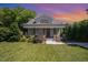 Charming home with a landscaped front yard, covered porch, and craftsman details at 200 W Corbin St, Hillsborough, NC 27278