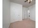 Bedroom with neutral carpet, white walls, and ceiling fan at 2007 October Dr, Durham, NC 27703
