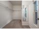 Walk-in closet with wire shelving and window at 2007 October Dr, Durham, NC 27703