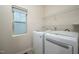 Laundry room featuring newer front load washer and dryer at 2007 October Dr, Durham, NC 27703