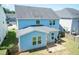 Aerial view of a fenced backyard with a patio, grill, and green space at 2008 Campana Dr, Raleigh, NC 27603