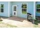 Back patio featuring a grill and access to the home's entry door at 2008 Campana Dr, Raleigh, NC 27603