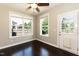 Bright breakfast nook with large windows overlooking the backyard, ideal for casual dining at 2008 Campana Dr, Raleigh, NC 27603