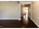 Elegant living room with dark hardwood flooring, neutral paint, and an open floor plan at 2008 Campana Dr, Raleigh, NC 27603
