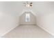 Bright, carpeted bedroom with a ceiling fan and natural light from the window at 202 Chapel Valley Ln, Apex, NC 27502