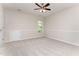 Empty bedroom with carpet, ceiling fan, and great natural light at 202 Chapel Valley Ln, Apex, NC 27502