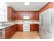 Spacious kitchen features modern appliances, ample counter space, and lots of cabinet storage at 202 Chapel Valley Ln, Apex, NC 27502