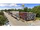 Aerial view of the downtown street with historic buildings and painted murals at 202 Purvis St, Garner, NC 27529