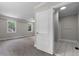 Open bathroom with a door in view at 202 Purvis St, Garner, NC 27529