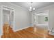 This charming dining room includes hardwood floors and access to multiple rooms at 202 Purvis St, Garner, NC 27529