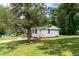 Charming single-story home with a well-manicured lawn and front porch at 202 Purvis St, Garner, NC 27529