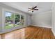 This spacious living room offers a large window and beautiful hardwood floors at 202 Purvis St, Garner, NC 27529