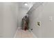 Compact utility room with shelving and hot water heater at 202 Purvis St, Garner, NC 27529