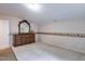 Spacious carpeted bedroom with a wooden dresser and mirror, featuring a decorative border at 2109 Star Sapphire Dr, Raleigh, NC 27610