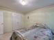 Cozy bedroom with a double bed, wallpaper border, and neutral carpeting at 2109 Star Sapphire Dr, Raleigh, NC 27610