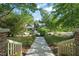 Inviting front yard and walkway leading to a charming home at 211 W Trinity Ave, Durham, NC 27701