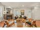 Inviting living room with a fireplace, stylish furnishings, and a warm ambiance at 211 W Trinity Ave, Durham, NC 27701