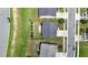 Aerial view showcasing a home with a fenced backyard and an outdoor seating area in a residential neighborhood at 2123 Scarlet Sage Dr, Durham, NC 27704