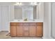 Bathroom showcasing a spacious double vanity with ample counter space and storage drawers at 2123 Scarlet Sage Dr, Durham, NC 27704