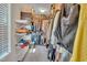 Organized walk-in closet with ample shelving and hanging space for clothing and accessories in the Primary suite at 2123 Scarlet Sage Dr, Durham, NC 27704