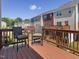 Outdoor deck with two chairs and a view of the neighboring townhouses at 215 Brier Summit Pl, Durham, NC 27703