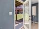 An interior view through glass doors of a deck and backyard at 215 Brier Summit Pl, Durham, NC 27703