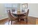 Comfortable dining area with wood table and padded chairs at 215 Brier Summit Pl, Durham, NC 27703
