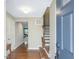 Bright foyer with hardwood floors and staircase leading to upper level at 215 Brier Summit Pl, Durham, NC 27703