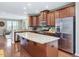 Open kitchen design with stainless steel appliances and center island at 215 Brier Summit Pl, Durham, NC 27703