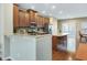 The kitchen features granite countertops, stainless steel appliances, and recessed lighting at 215 Brier Summit Pl, Durham, NC 27703