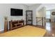 Open-concept living space with hardwood flooring and living room furniture at 215 Brier Summit Pl, Durham, NC 27703