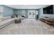 Expansive living area featuring a cozy sectional sofa and patio access at 215 Brier Summit Pl, Durham, NC 27703