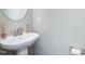 Modern powder room featuring stylish vanity and fixtures at 215 Brier Summit Pl, Durham, NC 27703