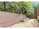 This backyard boasts a new privacy fence, clean landscaping, and lots of room at 2208 Pathway Dr, Chapel Hill, NC 27516
