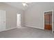 Main bedroom with ceiling fan, carpeted floors and private ensuite at 2208 Pathway Dr, Chapel Hill, NC 27516