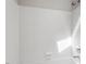 Clean white tiled shower and bath area at 2208 Pathway Dr, Chapel Hill, NC 27516